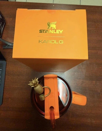 The Stanley 1913 x KAROL G 40 oz Quencher H2.O FlowState Tumbler